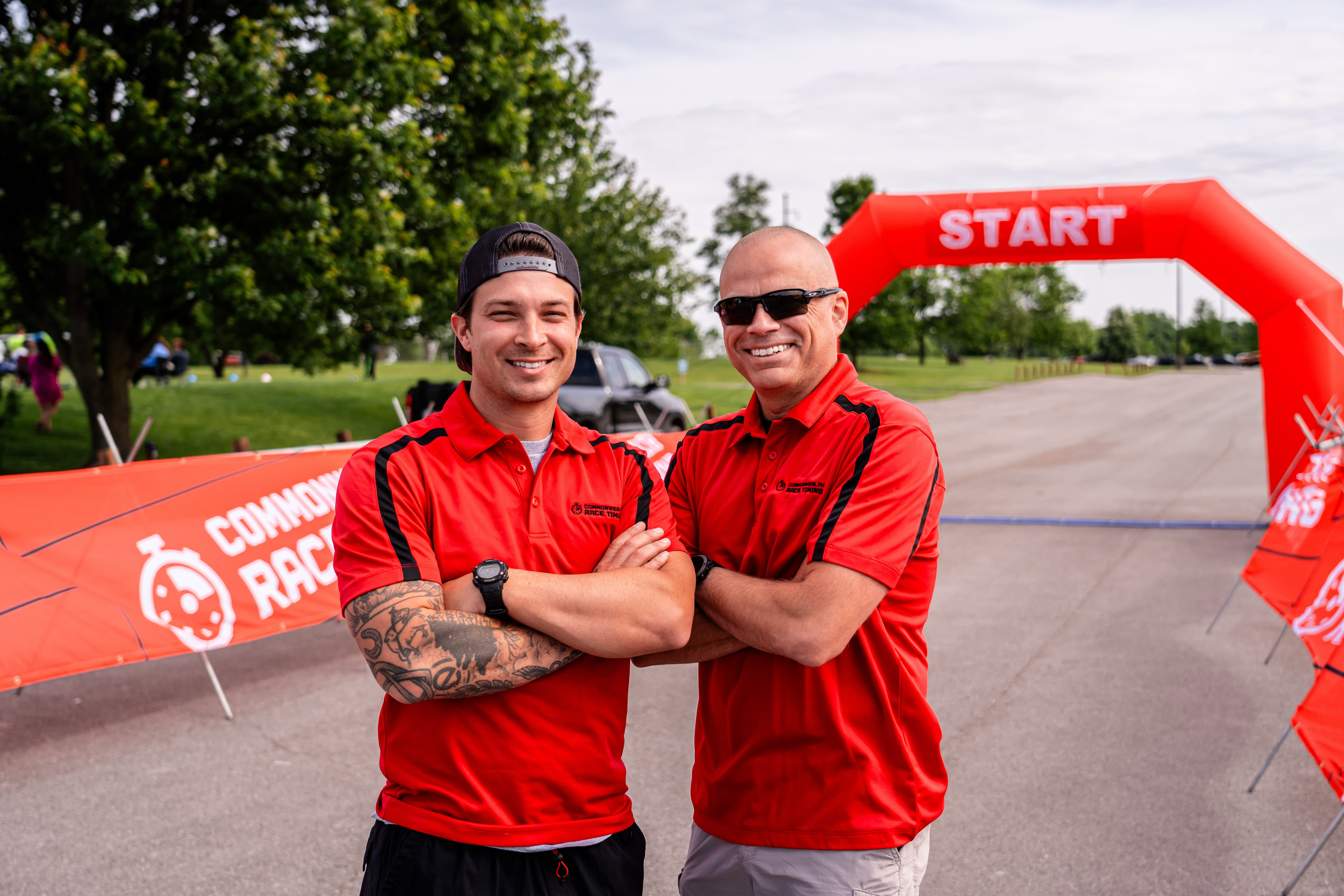 Josh and Jeremy beside the Commonwealth Race Timing finish arch